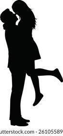 Silhouette of man lifting woman in joyful romantic embrace, expressing love and happiness