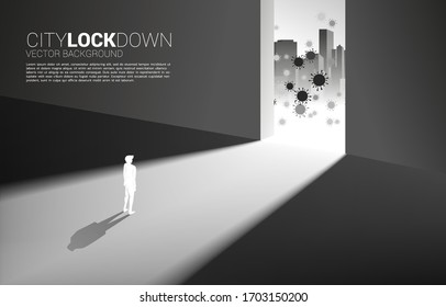 Silhouette of man lock down inside building from virus outside . Concept of city lock down social distancing and isolation.