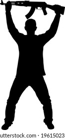 silueta de hombre con ametralladora