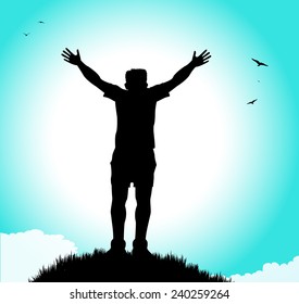 silhouette of man with open arms on hill