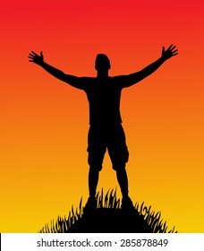 silhouette of man with open arms on hill