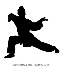 Silhouette of a man in oriental martial art pose. Silhouette of a male in martial art move.