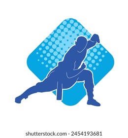 Silhouette of a man in oriental martial art pose. Silhouette of a male in martial art move.