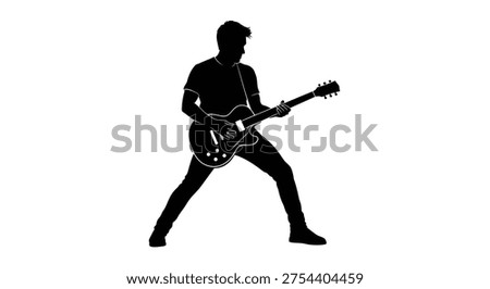 Silhouette of man playing guitar
