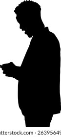 Silhouette of a man playing with a phone