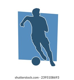 Silhouette of a man playing soccer. Silhouette of a football player in action pose.