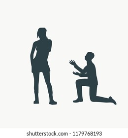 Silhouette of man in prayer pose. Man asking woman to marry him.