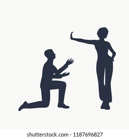 Silhouette of man in prayer pose. Man asking woman to marry or forgive him. A young woman holding her hand in front to show stop gesture