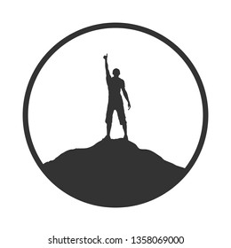 Silhouette of man with raised hand on top of the mountain, flat design