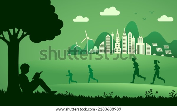 silhouette of a man reading a book\
under a tree in the garden, Smart city and good\
environment.