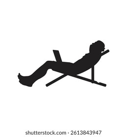 Silhouette of a man relaxing with a laptop