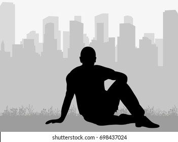 silhouette man sitting