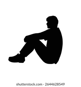 Silhouette of a man sitting alone thoughtful pose.