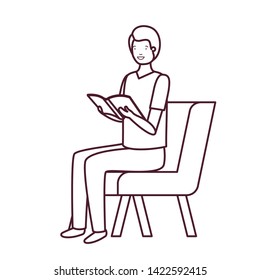 silhouette of man sitting in chair with book