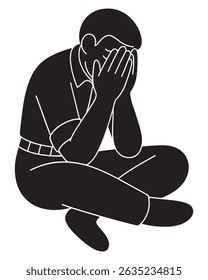 Silhouette of a man sitting cross-legged with face hidden in both hands, depressed man silhouette