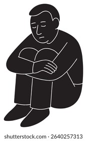 Silhouette of a man sitting with knees up and arms around them, lost in thought