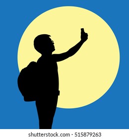 Silhouette man with smartphone with super full moon on background