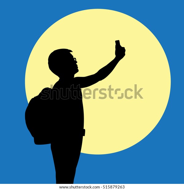 Silhouette man with smartphone with super full\
moon on background