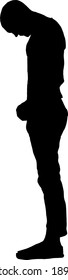 Silhouette of a man standing with his head bow in sombre mood. Vector illustration.