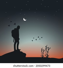 silhouette of a man standing on a suns