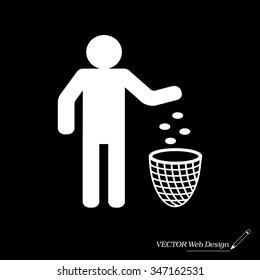 Silhouette of a man, throwing garbage in a bin