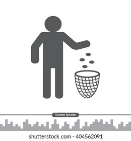 Silhouette of a man, throwing garbage in a bin