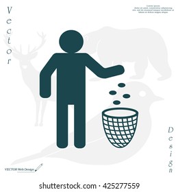 Silhouette of a man, throwing garbage in a bin