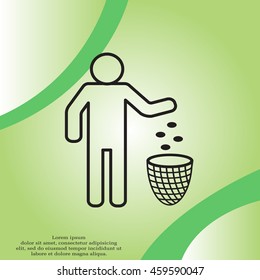 Silhouette of a man throwing garbage in a bin