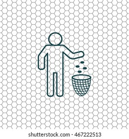 Silhouette of a man throwing garbage in a bin
