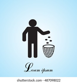 Silhouette of a man, throwing garbage in a bin