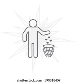 Silhouette of a man throwing garbage in a bin