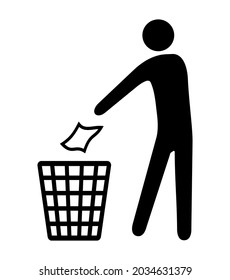 silhouette of a man throwing garbage in a trash can