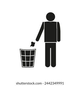 Silhouette of a man throwing trash into a trash can