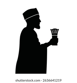 Silhouette of a man in traditional clothing holding a lamp.