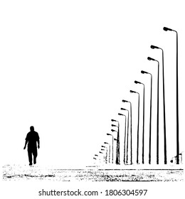 Silhouette of man walking alone on the street