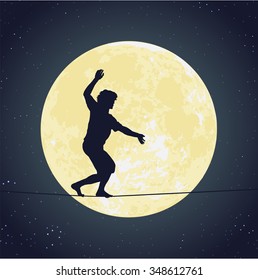 Silhouette Of A Man Walking On The Tight Rope In Front Of The Bright Full Moon In The Dark Starry Night