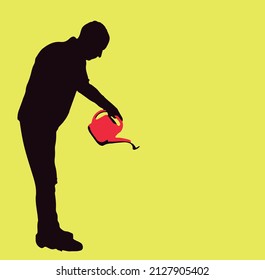silhouette of man with a watering can using it. He takes it in his hand and tilts it to water plants.
