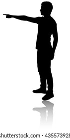 Silhouette of the man who points a finger