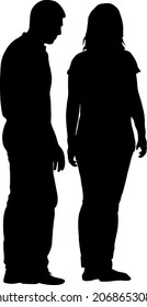 Silhouette man and woman stand side by side and talk.