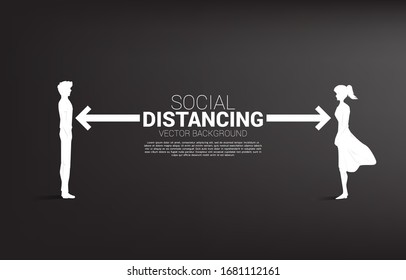 Silhouette of man and woman standing with distance for avoid virus. Concept of social distancing and isolation.