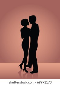 silhouette of man and women dancing