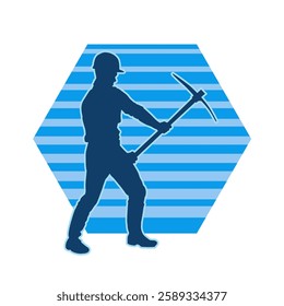 Silhouette of a man in worker costume carrying pick axe tool in action pose. Silhouette of a miner in action pose with pick axe tool.