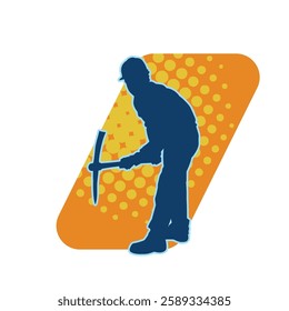 Silhouette of a man in worker costume carrying pick axe tool in action pose. Silhouette of a miner in action pose with pick axe tool.