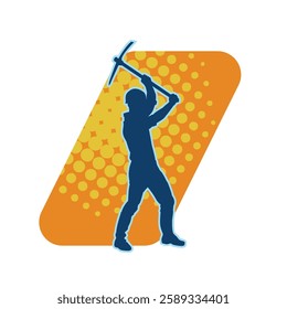 Silhouette of a man in worker costume carrying pick axe tool in action pose. Silhouette of a miner in action pose with pick axe tool.