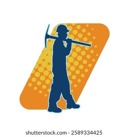 Silhouette of a man in worker costume carrying pick axe tool in action pose. Silhouette of a miner in action pose with pick axe tool.