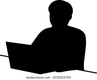 Silhouette of a man working on a computer