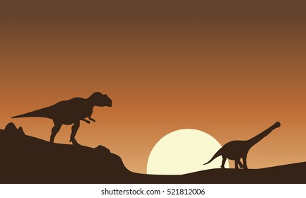 Silhouette of mapusaurus and argentinosaurus scenery