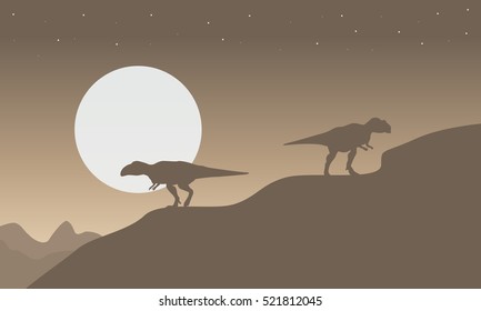 Silhouette of mapusaurus with big moon scenery