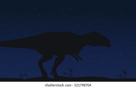 Silhouette of mapusaurus at night collection