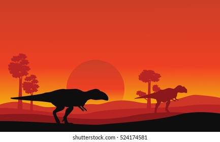 Silhouette of mapusaurus orange sky scenery